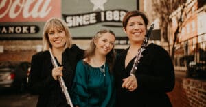 three women with instruments (alma)